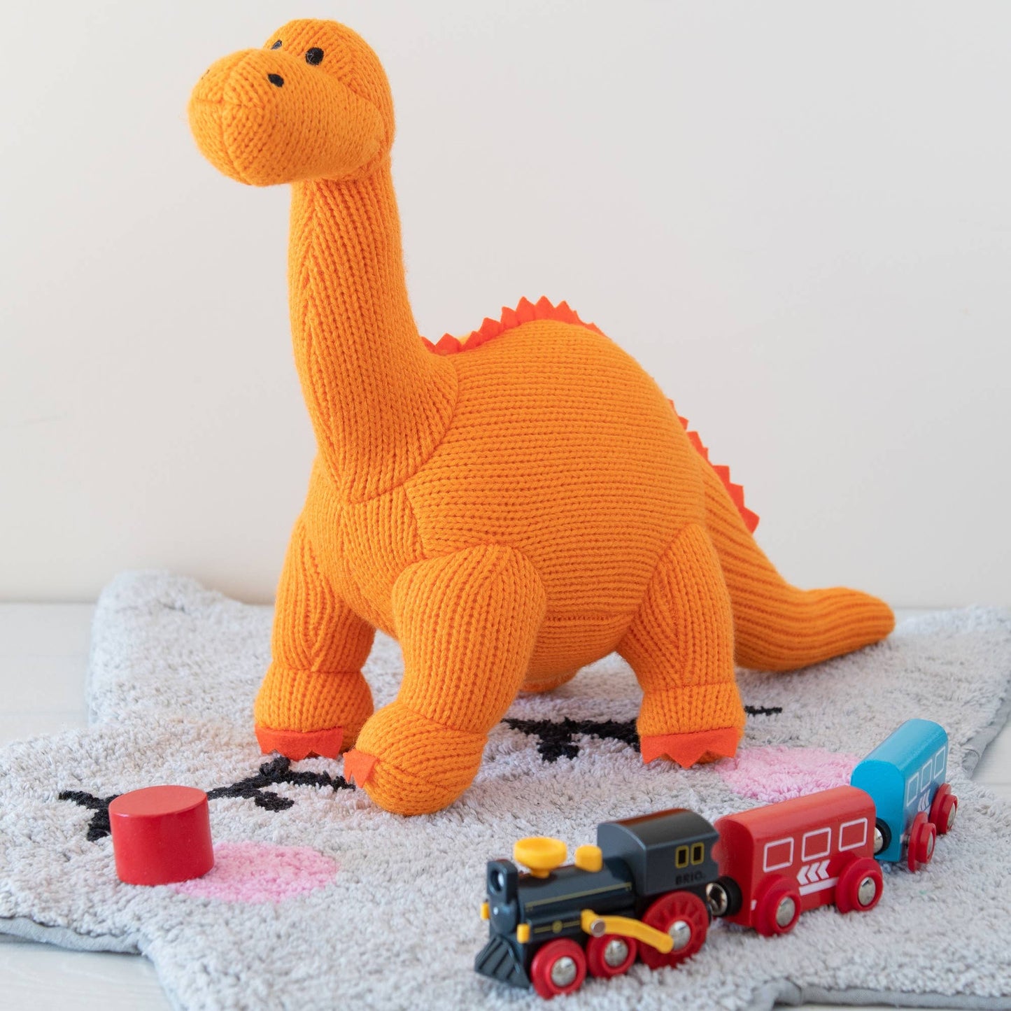 Knitted Orange Diplodocus Dinosaur Plush Toy