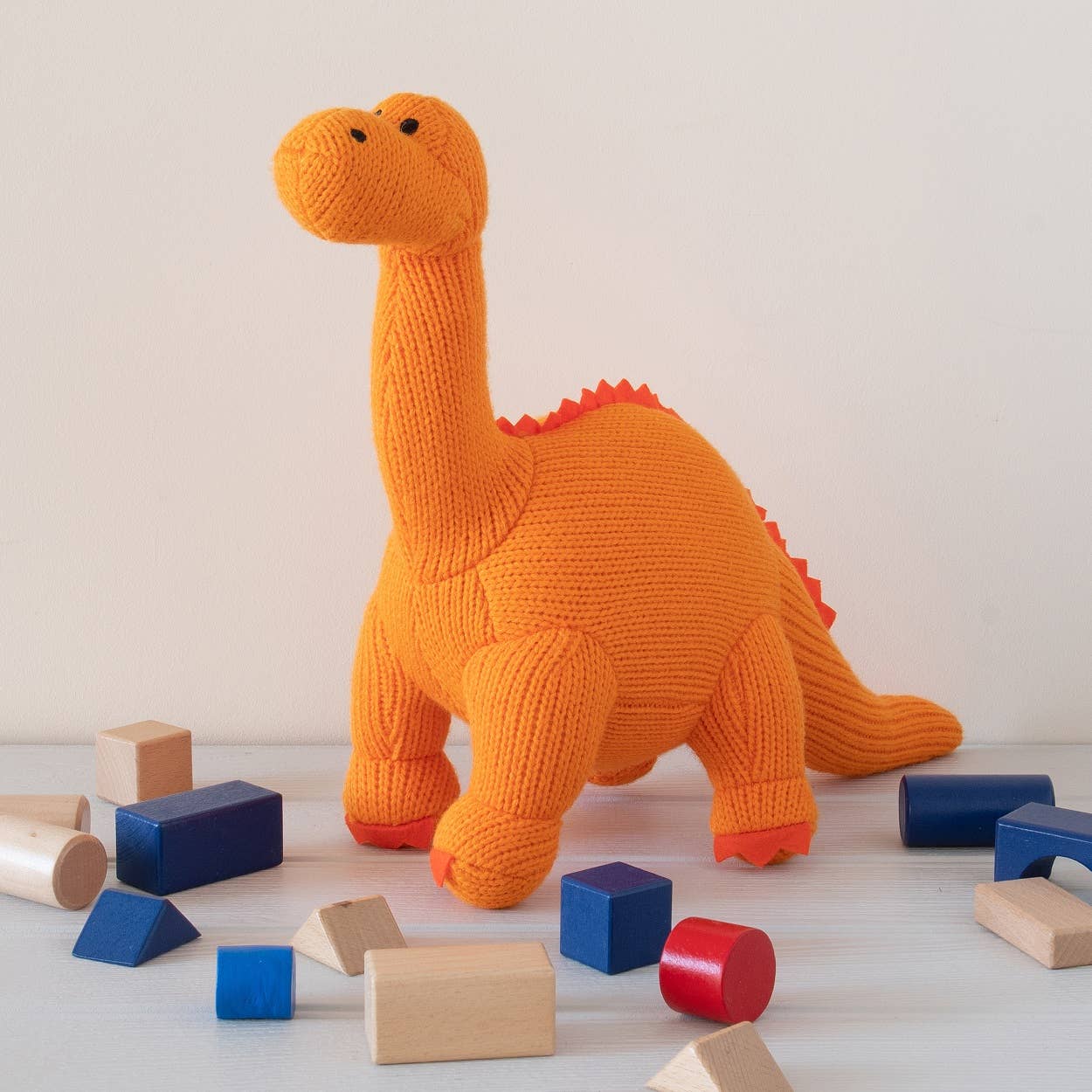 Knitted Orange Diplodocus Dinosaur Plush Toy